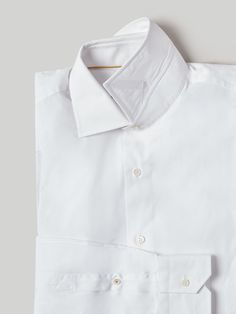 Designed in a modern fit, the Robert Talbott’s pinnacle dress shirt, the luxurious Craig Estate shirt is made in Italy and features our signature Monterey semi-spread collar with removable collar stays. Every construction detail, whether it’s the split back yoke or the lightweight pique neck channel, was explicitly chosen to enhance the way the shirt drapes, reduce bulk and optimize overall comfort.  So, whether you’re attending a board meeting as a lead investor or philanthropic adviser, this I Designer Fitted Shirt For Business, Designer Fitted Collared Shirt, Designer Business Shirt With Spread Collar, Fitted Luxury Long Sleeve Dress Shirt, Luxury Fitted Long Sleeve Dress Shirt, Designer Formal Shirt With Collar, Designer Semi-formal Shirt With Fold Down Collar, Designer Formal Collared Shirt, Designer Fitted Collared Dress Shirt