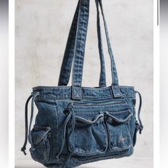 Nwt Uo Bdg Y2k Denim Cargo Tote Bag. In Great Condition, Measures 11.25” Height, 15.75” Length And 4.5” Depth *I Try My Best To Look For And Mention All/Any Flaws But They Are Sometimes Missed. Most Clothes Are Used/Worn And May Come With Minor Imperfections. Don’t Hesitate To Ask For Measurements If Unsure Of Fit* Casual Denim Satchel Shoulder Bag, Casual Denim Shoulder Bag For Everyday, Trendy Denim Shoulder Bag With Pockets, Casual Denim Shoulder Bag For Daily Use, Casual Denim Blue Shoulder Bag, Blue Denim Shoulder Bag With Pockets, Casual Denim Bag With Double Handle, Casual Denim Double Handle Bag, Denim Bags With Double Handle And Pockets