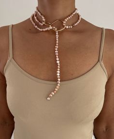 ** Pearl Necklace loops through Ring and can be wrapped once or multiple times. PEARLS are symbolic of wisdom gained through experience. The gems are believed to offer protection, as well as attract good luck and wealth. They are well-known for their calming effects. Pearls have a way of bringing balance to your karma, bring illumination, enlightenment, and insights on a mental level. Pearls symbolize purity and is known as a “stone of sincerity”. It brings truth to situations and loyalty to a “ Luxury Pearl Necklace With Tilla For Gift, Luxury Gold Spiritual Pearl Necklace, Luxury Polished Beads Bridal Necklace For Gift, Luxury Faceted Pearl Necklace For Gift, Luxury Spiritual Pearl Necklace, Luxury Natural Stone Pendant Pearl Necklace, Luxury Mother Of Pearl Gemstone Necklace, Luxury Gift Bridal Necklace With Polished Beads, Luxury Beaded Necklaces With Stones As Gifts