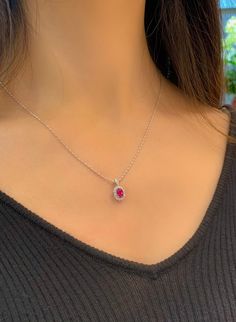 Model Number: REE1PGX184 18K Gold Ruby pendant Available: Yellow and White Gold Metal Stamp: 18k Au750 Metals Type: 18K Gold Weight/g: 0.99 Stone: Material Rubyd/1pc and Weight/ct 0.62 Side Stone: Diamond/2 1pcs and Weight/ct 0.23 Metal Color: White Gold Setting Type: Prong Setting Gender: Unisex Fine White Gold Ruby Necklaces With Brilliant Cut, White Gold Ruby Necklace With Brilliant Cut, Formal White Gold Ruby Necklace, Exquisite Round Ruby Necklaces, White Gold Ruby Necklace With Diamond Cut, Exquisite White Gold Oval Pendant Jewelry, Formal Ruby Pendant Necklace, Elegant White Gold Ruby Necklace, Fine Jewelry Oval Pendant Necklace With Brilliant Cut