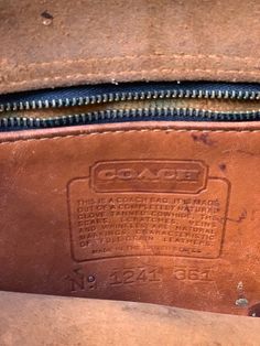 "Authentic vintage Coach purse, made in the USA (see label with made in USA and 7 digit serial number, consist with authentic 70's coach) Brown leather crossbody purse, with flap and snap closure Leather interior with one zipper pocket and one additional organizer pocket Measurements: 11\" width 7\" height 3 1/2\" base depth 47\" strap length at longest Good vintage condition! General cosmetic wear to leather surfaces and interior. Scuffs and marks throughout. Some splits in leather along piping Brown Leather Crossbody Purse, Leather Fanny Pack, Leather Coach, Leather Crossbody Purse, Coach Purse, Vintage Coach, Coach Purses, Crossbody Purse, Vintage Brown