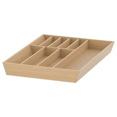 a wooden tray with six compartments on it