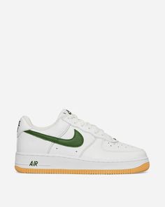 Iconic AF1 style in a fresh forest green and white colorway perfect for showcasing on social. Customized like the original 1984 Color Of The Month releases, this must-have sneaker will elevate any Instagram fit with it's standout hue and perforated toebox detailing. Included shoe brush makes caring for the supple leather upper effortless so these streetwear staples can be flaunted again and again. Enduring quality and customization in every step. Green Throwback Sneakers For Streetwear, Throwback Sneakers With Gum Sole For Sports, Throwback Lace-up Sneakers With Gum Sole, Throwback Low-top Sneakers With Gum Sole, Sporty Nike Air Force 1 Low-top With Gum Sole, Sporty Low-top Nike Air Force 1 With Gum Sole, Nike Air Force 1 Green With Gum Sole, Nike Air Force 1 Gum Sole Sporty Streetwear, Nike Air Force 1 Sporty Gum Sole For Streetwear