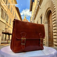 This Italian leather satchel bag is a testament to exquisite craftsmanship and timeless elegance. Handmade in Florence, Italy, using the finest genuine leather, it combines premium quality, luxury, and modern Italian fashion. Elevate your style with this meticulously crafted accessory that exudes sophistication and showcases the rich heritage of Italian craftsmanship. Experience the perfect blend of functionality and style with our Italian Handmade Leather Satchels Bags for Men. . Size: Width:32cm/12.6 inch Height:26cm/10.4 inch Depth: 10cm/4 inch  . The story of this bag: Once upon a time in the picturesque city of Florence, Italy, skilled artisans dedicated their lives to the art of leather craftsmanship. In their humble workshops, they meticulously handcrafted satchel bags with utmost p High-end Brown Business Shoulder Bag, Luxury Shoulder Bag With Coin Pocket For Business, Elegant Business Bags With Coin Pocket, High-end Brown Briefcase, Luxury Rectangular Shoulder Bag With Coin Pocket, Elegant Brown Briefcase As A Gift, Designer Leather Shoulder Bag With Coin Pocket, Luxury Vegetable Tanned Leather Satchel Bag, Luxury Vegetable Tanned Leather Satchel For Business