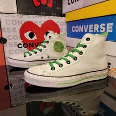 Converse / Ctas Hi Size: Uk 10/ M 10/ W 12 Color: White/Green Condition: Brand New!! The Shoes Come From The Factory With A Distressed Look. Casual Green Canvas Shoes With Round Toe, Green Canvas Shoes For Streetwear, Trendy Green Canvas Shoes With Rubber Sole, Casual Green Canvas Shoes, Green Cotton Sneakers With Vulcanized Sole, Green Canvas Shoes With Gum Sole For Streetwear, Green High-top Canvas Shoes For Streetwear, Green Mid-top Canvas Shoes For Streetwear, Trendy White Canvas Shoes For Streetwear