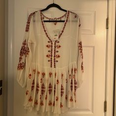 Free People Nwt Size M Long Sleeve White Dress With Detailing Smoke Free, Dog Friendly Home White Long Sleeve Boho Dress For Fall, White Long Sleeve Summer Boho Dress, White Mini Dress For Fall Beach Outings, Flowy White Boho Dress For Fall, White Tunic Dress For Fall, White Tunic Fall Dresses, White Bohemian Tunic For Brunch, White Long Sleeve Boho Dress, Embroidered Long Sleeve Peasant Boho Dress