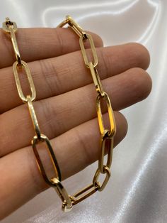 "18k Real Gold paper clip Necklace ,18\",6 mm, 12.61 gr . 18k Real Gold paper clip Necklace ,22\",6 mm, 14 gr . 18k Real Gold paper clip Bracelet ,7.5\" ,6 mm, 5.42 gr . Priced to sell! Compare our prices to other similar sellers! Arrives in a GIFT BOX and includes FREE SHIPPING within the USA and Canada. International shipping is available at the most economical rates on ETSY. I HAVE BEEN IN THE JEWELRY BUSINESS ALL MY LIFE. I am a second -generation family member making gold and jewelry. Please feel free to ask me any questions - Always happy to help! Fast Replies to messages! Superior Quality and Best Prices!" Formal Gold Chain Paperclip Bracelet With Oval Link, Gold Plated Oval Chain Necklace, Gold Plated Paperclip Chain Bracelet, Classic Gold-plated Paperclip Chain Necklace, Gold Plated Paperclip Link Bracelet, Modern Gold Plated Paperclip Chain Bracelet, Yellow Gold Paperclip Chain Bracelet As Gift, Gold Plated Paperclip Chain Necklaces With Oval Links, Gold Paperclip Bracelet With Figaro Chain Links