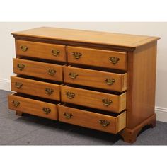 an old wooden dresser with many drawers