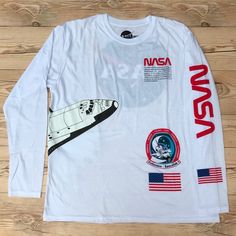 Brand New Without Tags Nasa Long Sleeve T-Shirt Men’s Size Xl 9578, 2b White Long Sleeve Top With Front Print, Graphic Tee With Front Print Long Sleeve, Long Sleeve Graphic Tee With Front Print, Casual Crew Shirt With Letter Print, Casual Crew Neck Shirt With Letter Print, Casual Long Sleeve Shirt With Logo Print, Casual Crew Top With Front Print, Casual Crew Neck Top With Front Print, Nasa Shirt