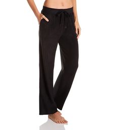 This extra comfy lounge pant is made from a soft fleece with a relaxed fit for ultimate coziness. Made from polyester and spandex for stretch. Wide, covered elastic waistband adjusts with flat, woven drawstring for the perfect fit. Drawstring has coated metal end caps. Large pockets at the side seams for convenience. Center back seam gives the fit definition. Cuddl Duds logo embroidered above the left leg hem. Wide, straight legs have self-lined hems. High waisted for modern look. Full length. R Comfortable Solid Color Lounge Pants, Comfortable Full-length Sweatpants For Relaxation, Comfy Soft Sweatpants For Lounging, Comfy Relaxed Fit Bottoms For Home, Soft Comfy Sweatpants For Lounging, Comfy Relaxed Fit Bottoms For Relaxing At Home, Comfy Bottoms With Relaxed Fit For Home Relaxation, Cozy Solid Color Bottoms For Relaxation, Soft Sweatpants For Lounging