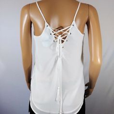 White Naked Zebra Spring Top White Tank Top With Adjustable Straps For Night Out, White Camisole With Straps For Night Out, White Backless Tank Top With Straps, Backless White Tank Top With Straps, White Strappy Top With Crisscross Straps, White Strappy Tank Top With Built-in Bra, Spring Tops, White Tops, Color White