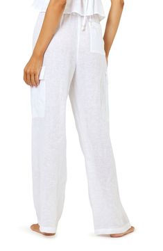 Move from beach to cocktails in these lightweight linen pants updated with cool cargo pockets. 31" inseam; 10" front rise; 14" back rise Ties at waist Cargo pockets Unlined 100% linen Hand wash, line dry Imported Cotton Cargo Pants For Vacation, Casual Cargo Pants With Pockets For Vacation, Vacation Harem Pants With Pockets, Summer Bottoms With Patch Pockets, Relaxed Fit Linen Cargo Bottoms, Relaxed Fit Linen Cargo Style Bottoms, Straight Leg Linen Cargo Pants, Casual Linen Cargo Bottoms, Wide Leg Linen Parachute Pants With Cargo Pockets