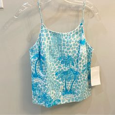 Brand New With Tags Vintage White Label Lilly Pulitzer Sleeveless Camisole Style Top Size 2 In Blue Jumbo Giraffe. Fully Lined With A Hidden Back Zipper, Spaghetti Straps And White Rikrak Trim At Neckline. Measures 21 1/2” Shoulder To Hem And Approx. 16” Underarm To Underarm Not Taking Acct The Front Dart. From Pet Free Smoke Free Home. White Label, Vintage Tags, Dart, White Vintage, Lilly Pulitzer, Spaghetti Strap, Top Styles, Sleeveless Top, Blue White