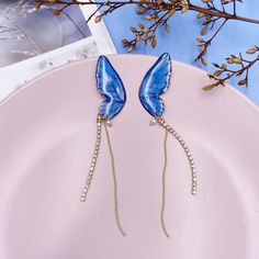 Material: Metal Trendy Blue Dangle Earrings, Trendy Blue Drop Earrings, Trendy Light Blue Drop Earrings, Trendy Light Blue Dangle Earrings, Trendy Light Blue Party Jewelry, Trendy Light Blue Jewelry For Party, Light Blue Earrings For Party, Kawaii Earrings, Butterfly Wing Earrings