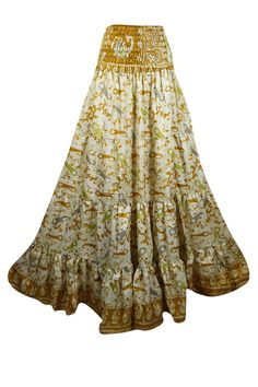 Embrace your free-spirited side with our Boho Chic Maxi Skirt, designed for the modern soul who loves to blend Gold printed Floral comfort and style. This flowing, maxi-length skirt features vintage-inspired tribal prints and earthy tones, perfect for creating a laid-back yet hippie-style look. Handcrafted with care, the skirt boasts tiered layers and subtle, giving it a graceful, gypsy flair. Whether you're strolling on the beach or attending a festival, this relaxed-fit statement skirt will fl