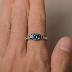 This is a gorgeous handmade creation. Its beauty is its simplicity & Elegance. The 6*6 mm trillion cut faceted real blue topaz is crafted in solid sterling silver and with rhodium plated. All item is sent in a beautiful gift box If you have any idea of design your ring,pls contact me directly. You can realize more lovely stuff clicking the link https://www.etsy.com/shop/knightjewelry?refshopsection_shophome_leftnav Please leave the correct address and you phone number for delivering successf Blue Topaz Rings, Cushion Cut Wedding Rings, Topaz Rings, Proposal Rings, Etsy Engagement Rings, Sapphire Diamond Engagement, September Birthstone Rings, Ring Proposal, Blue Gemstone Rings