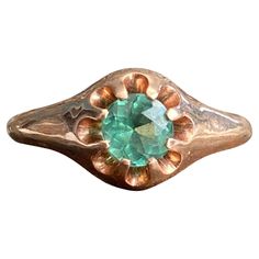 Details: Very pretty vintage rose gold solitaire ring with a bright blue green tourmaline. Simple 14K rose gold with a raised prong set stone, this ring has a very classic sweet look! The green in the stone is green with a subtle blue cast—think of tropical ocean waters! Super pretty color! This ring has no interior markings, but the gold has been tested and is 14K. This is a very pretty ring—you will not be disappointed! Please ask all necessary questions prior to placing an order. Measurements: The size is 7 1/4 US and can be sized for a fee. This ring weighs 2.4 grams. Condition: The overall all condition of this ring is very good. Rose Gold Solitaire Ring, Verde Vintage, Tropical Ocean, Pretty Ring, Vintage Rose Gold, Gold Solitaire Ring, Pretty Rings, Vintage Rose, Green Tourmaline