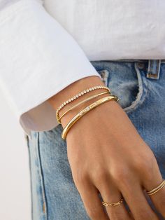 Let your bangles do the talking. The Destiny Bangle is classically chic with three shining cubic zirconia stone to add some bling. Wear the bangle alone or pair with others to make a statement. Gold Medallion Necklace, Gold Bracelets Stacked, Pave Bangle, Classic Bangles, Safety Pin Earrings, 18k Gold Earrings, Gold Bead Bracelets, Gold Ring Sets, 18k Gold Ring