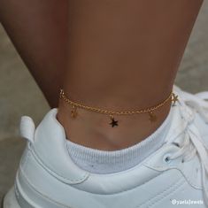 "Dainty gold stars anklet. Perfect for layering with more anklets. This anklet is a great gift for a loved one, or as a well deserved gift to yourself. More Anklets: https://www.etsy.com/shop/YaelaJewels?section_id=23700103 ★Item Details: Gold chain with star charms - 2 micron gold plated (extremely high quality material). Gold filled spring clasp and links. 8\" + 1.5\" adjustable chain extender. Please make sure this size fits your ankle. If you need a different length, simply indicate your des Cute Gold Anklets, Anckel Chain, Gold Anklet Aesthetic, Ankle Bracelets Aesthetic, Anklets Aesthetic, Cute Accessories Aesthetic, Anklets Gold, Ankle Accessories, Afro Jewelry