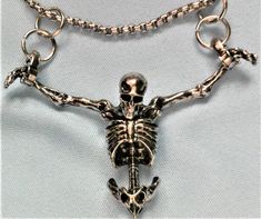 Hanging Skeleton & Necklace - Necklace is 23 inches -- Skeleton is 2.25 inches wide and Height is 1.25 inches Hanging Skeleton, Skeleton Necklace, Fantasy Garb, Skeleton Model, Hollywood Fl, Necklace Necklace, Traditional Jewelry, Fashion Fits, Gift List