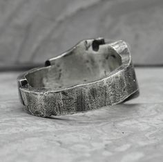 Project50g | Cascade ring- asymmetrical brutalist signet ring with solid silver texture – project50g Brutalist Style Open Ring Jewelry, Brutalist Sterling Silver Signet Ring, Silver Brutalist Hammered Ring, Brutalist Hammered Silver Ring, Silver Texture, Product Card, Font Examples, Unusual Rings, Large Stone