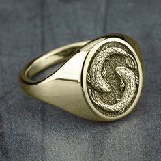 Pisces - The Fish: You are imaginative, selfless, and sensitive. Your compassion and understanding lead you to put others' needs before your own. You do not criticize others for their faults, but instead, accept people for who they are. 16mm oval signet ring 10K Yellow Gold with matching center Available in 2 fits: Luxe and Basic Available in 2 finishes: Satin and Polish Signet Rings Men, Jewelry Masculine, Men’s Ring, Men Rings Gold, Mens Signet Rings, Mens Jewelry Gold, Oval Signet Ring, Fish Ring, Unique Mens Rings