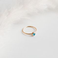 This listing is for a beautiful birthstone ring, crafted from high-quality metal and gemstone that represents the wearer's birth month. Each birthstone is associated with specific qualities, making this ring a meaningful and personal accessory. The ring features a simple yet elegant design that showcases the gemstone. Whether worn as a daily reminder of one's special qualities, or given as a sentimental gift, this birthstone ring is a timeless and cherished accessory. Choose your birth month and Dainty Crystal Ring With Birthstone For Promise, Dainty Crystal Birthstone Ring For Promise, Gold Topaz Birthstone Promise Ring, Dainty Birthstone Crystal Ring, Gold Crystal Birthstone Ring For Gift, 14k Gold Topaz Birthstone Ring Gift, Dainty Crystal Birthstone Ring As Gift, Dainty Crystal Birthstone Ring For Anniversary, Minimalist Topaz Birthstone Ring As Gift