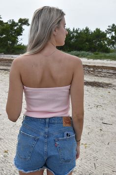 Light Pink Twisted knit Top Chic Stretch Pink Knit Top, Trendy Pink Strapless Top, Trendy Pink Fitted Crop Top, Trendy Pink Stretch Tube Top, Trendy Pink Bandeau Top, Feminine Stretch Bandeau Tube Top, Pink Seamless Tube Top, Pink Fitted Knit Top, Pink Seamless Bandeau Tops