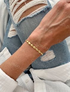 "All Our Bracelets Are Made Of REAL 14K GOLD  14K Yellow Gold Pebble Link Chain Bracelets Women, 4mm Thick, 7\" Inch, Real Gold Bracelet, Flat Oval Links  Shop our 14K Bracelets https://www.etsy.com/shop/GOLDMANIA?ref=seller-platform-mcnav§ion_id=26925987  Shop On Sale items https://www.etsy.com/shop/GOLDMANIA?ref=seller-platform-mcnav§ion_id=1  Metal: 14K Yellow Gold   Width: 4 MM  Length: 7 IN  Closure: Lobster claw Weight: 2.75 Gram   Matching necklace available. Contact us for more informati Gold Oval Link Oyster Bracelet Gift, Dainty Gold Oval Bracelets, Gold Plated Oval Bracelet, Elegant Gold Bracelets With Oval Beads, Gold Bracelets With Oval Beads For Gift, Real Gold Bracelet, Gold Herringbone Chain, Gold Bracelet Simple, Dainty Gold Bracelet