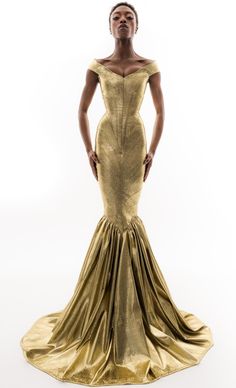 Unique Creation, Only ONE will be produced ! Craftsmanship : This stunning Golden Lurex Mermaid Corseted-Dress is made to order !  Entirely custom-made, it is crafted by our Maître Artisan Corsetier  Stylist Costumier in our artisanal workshop in Rouen, France. From the sketch to the finished product, every detail of this piece is handcrafted with unique expertise. (We will contact you for measurements after your order, don't forget to fill in your contact information !) For a creation perfectly Mermaid Corset Dress, Gold Fitted Mermaid Wedding Dress, Elegant Fitted Mermaid Gown, Fitted Couture Evening Dress, Couture Fitted Evening Dress, Gold Fitted Mermaid Hem Gown, Gold Fitted Mermaid Dress For Prom, Gold Fitted Gown For Prom, Fitted Gold Gown For Prom