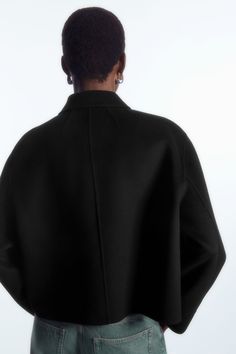 BOXY DOUBLE-FACED WOOL JACKET - BLACK - COS Winter Cashmere Outerwear With Pockets, Classic Oversized Cashmere Outerwear, Classic Oversized Long Coat, Winter Long Sleeve Cashmere Blazer, Oversized Classic Long Coat, Oversized Long Sleeve Cashmere Outerwear, Oversized Cashmere Outerwear For Winter, Oversized Cashmere Sweater Coat For Work, Modern Wool Blazer For Fall