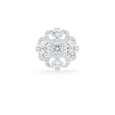 There is a kaleidoscopic feel to the Ellesmere Treasure set and this exceptional ring, comprising 101 white diamonds, unfurls into a frozen flower. Surrounding a 1.20 carat cushion-cut white diamond is a row of round brilliant pavé. From this, arcs of pavé emanate, tipped with marquise-cut diamonds. Round brilliant pavé extends down the upper shank to further enhance the scintillation of this very special piece. Total weight, 3.75 carats. Luxury White Diamond Ring With Single Cut Diamonds, Luxury White Single Cut Diamond Ring, Luxury White Diamond Ring With Pave Setting, Luxury White Radiant Cut Ring, Cushion Cut Lab Grown Diamond Ring In Diamond White, White Platinum Diamond Ring With Pave Setting, Lab Grown White Diamond Ring, Cushion Cut, Luxury Diamond Cluster Ring With Princess Cut, Luxury Princess Cut Diamond Cluster Ring