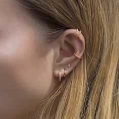 Textured Rose Gold Conch Ear Cuff that will hug your cartilage perfectly. Perfect to wear alone or paired with other huggie earrings. Sold as a single earring. Rose Gold Vermeil Hypoallergenic, lead and nickel free Thickness 1.5mm Inside Diameter 9mm Outer Diameter 12mm #E521-RG Ear Piercing, Huggie Earrings, Hand Jewelry, Single Earring, Dainty Jewelry, Conch, Huggies Earrings, Rose Gold Plates, Gold Vermeil