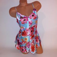 Victoria Secret Lingerie One Piece Romper Small Blue Pink Floral Tie Back Wireless Sleepwear New With Tags *Bundle To Save Chavonne11 71222 Stretch Sleepwear With Built-in Bra For Summer, Summer Sleepwear Camisole With Built-in Bra, Sleeveless Summer Slip With Built-in Bra, Flirty Camisole Sleepwear With Built-in Bra, Flirty Summer Sleepwear With Built-in Bra, Victoria's Secret Spring Camisole With Built-in Bra, Victoria's Secret Sleeveless Sleepwear With Built-in Bra, Fitted Sleepwear For Summer Pajama Party, Fitted Sleepwear For Pajama Party In Summer