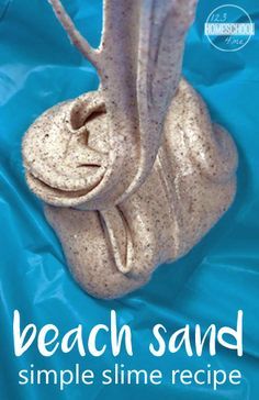 a white sand sculpture sitting on top of a blue plastic bag with the words beach sand simple slime recipe written below it