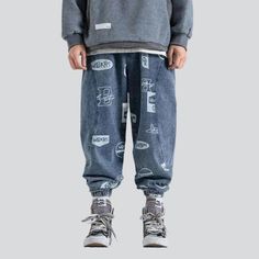 Step out in style with the 2023 Spring-Summer Collection's medium-waist denim joggers! Crafted with premium denim. these joggers feature a street-style distressed pattern and drawstrings closure. making them the perfect blend of contemporary fashion and nostalgic grunge.Why They're Your Next Summer Staple: Grunge Galore: Inspired by the iconic '90s grunge movement. these joggers exude an effortlessly cool attitude. Distinctive Paint Pattern: Expertly crafted with a unique street-style paint patt Casual Graphic Print Jeans For Streetwear, Casual Graphic Print Pants For Streetwear, Hip Hop Denim Bottoms With Graphic Print, Casual Denim Blue Pants With Graphic Print, Casual Straight Leg Bottoms With Graphic Print, Baggy Denim Bottoms With Graphic Print, Denim Pants With Elastic Waistband For Streetwear, Casual Denim Blue Bottoms With Graphic Print, Denim Blue Graphic Bottoms For Streetwear