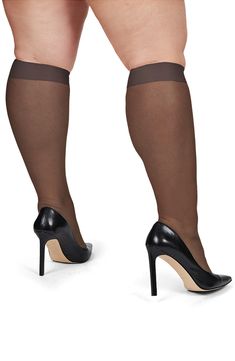 These knee-highs with a wide cuff are delightfully translucent and easy to keep in place all day long. Nylon/spandex Machine wash, dry flat Imported Black Nylon Knee-high Socks, Fitted Mid-calf Legwear, Knee-high Stockings, Fitted Nylon Elegant Socks, Black Stretch Nylon Knee-high Socks, Black Knee-high Nylon Socks, Sheer Stretch Knee-high Legwear, Fitted Nylon Knee-high Socks, Fitted Sheer Black Socks