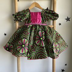 Dress for kids, Handmade in Nigeria,  Stand out from the crowd and express your individuality with a one-of-a-kind African print design. Find a style that reflects your personality, from bold and beautiful dresses to classic shirts and pants. Your purchase empowers the talented artisans of Abia State and helps preserve this special cultural tradition. Bring a touch of African vibrancy and cultural richness to your wardrobe. Order your handmade African print clothing today! Please note: Due to th Shirts And Pants, Dress For Kids, African Print Clothing, African Children, Handmade African, Bold And Beautiful, Shirt And Pants, Classic Shirt, African Print