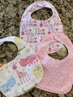 These bibs make the perfect gift for any baby girl. They are made out of soft flannel with a water proof backing to keep clothes underneath clean and dry. Cute Cotton Bib For Playtime, Cute Pink Bib As A Gift, Cute Pink Bib For Gift, Cute Pink Bib As Gift, Playful Machine Washable Bib As Gift, Cute Handmade Cotton Bib, Cute Multicolor Machine Washable Bib, Cute Machine Washable Bibs For Playtime, Pink Cotton Bib As A Gift