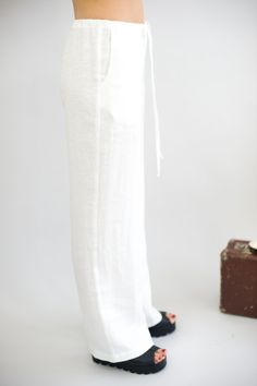 Extremely comfy and amazingly looking linen, harem style pants for women. These pants look stylish and will look equally beautiful with any style tops. Pants has two side pockets and drawstring closure in the front. These linen pants can be worn on many occasions, especially for casual time, during holiday and beach season. Perfect bottoms solution for women who prefer elegance, comfort and style combined in their every day life. Your will love the quality and design of these pants. Sewn with me White Linen Harem Pants For Summer, White Linen Wide Leg Harem Pants, White Linen Wide-leg Harem Pants, Linen Harem Pants For Loungewear, Linen Loungewear Harem Pants, White Linen Harem Pants For Loungewear, Summer Linen Harem Pants Straight Cut, Linen Ankle-length Harem Pants For Beach, Summer Linen Harem Pants