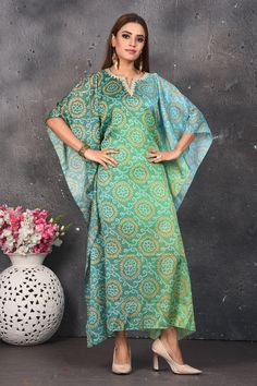 Elegant ombre green bandhani print kaftaan dress is a perfect party and festive wear. Shop designer dresses in USA from Pure Elegance. Bohemian Multicolor Gown For Eid, Green Bollywood Style Maxi Length Kaftan, Green Bollywood Style Maxi Kaftan, Green Maxi Length Kaftan For Festivals, Green Maxi-length Kaftan For Festivals, Green Dabka Kaftan Maxi Length, Green Dabka Maxi Length Kaftan, Green Dabka Embellished Maxi Kaftan, Green Maxi Length Kaftan With Dabka Details