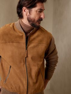 Subtle, yet absolutely striking, this rugged bomber blurs the lines between sweaters and true outerwear with a soft Merino wool fabrication and front panels made of soft, supple suede, accented by intricate herringbone stitches at the cuffs and hem f Leather Outerwear With Long Sleeves And Ribbed Cuffs, Leather Outerwear With Ribbed Cuffs For Winter, Casual Fall Outerwear With Suede Overlays, Casual Suede Overlay Outerwear For Fall, Brown Spring Outerwear With Ribbed Cuffs, Fitted Brown Outerwear With Ribbed Collar, Spring Brown Outerwear With Ribbed Cuffs, Casual Suede Overlay Long Sleeve Outerwear, Leather Outerwear With Ribbed Collar For Fall