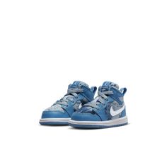 Your kiddo is all about summertime fun, and these Jordan 1s will bring the sunshine. Comfy and durable, the leather and tie-dye denim upper is built to last. A pull tab makes on-and-off extra easy so your little one can spend less time getting ready and more time playing outside.Leather and denim in the upper add durability.Soft, flexible midsole is lightweight and cushiony.Rubber outsole provides traction on a variety of surfaces.Pull tab at the collar makes it easy to put 'em on and take 'em o Non-slip Secure Fit Synthetic Sneakers, Non-slip Mid-top Synthetic Sneakers, Playful Non-slip Synthetic Sneakers, Sporty High-top Non-slip Jordan Shoes, Non-slip High-top Sneakers For Training, Sporty Slip-resistant Sneakers For Playtime, Playful Non-slip Sneakers For Sports, Playful Non-slip Sports Sneakers, Non-slip Synthetic Jordan Shoes For Streetwear