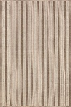 a brown and white striped rug