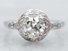 an old mine cut diamond engagement ring