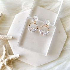 Rejoice Pearl & Flower Earrings are the most adorably dainty earrings that feature tiny flowers with an iridescent sheen and mini faux pearls. About 1.75 in long Pearl Flower Earrings, Pearl Flower, Tiny Flowers, Dainty Earrings, Flower Earrings, Faux Pearl, Stud Earrings, Flowers