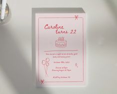 a pink birthday card with a cake on it's side and the words carbone turn 22 written in red