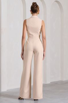 Endure is an endearing jumpsuit to keep in your wardrobe for those last-minute invites. Tailored in a sleeveless single-breasted silhouette. this stone-coloured staple features curved shawl lapels. a buttoned waistbelt and wide legs. Style this neutral jumpsuit with sparkly earrings for a dazzling yet versatile evening ensemble.Features- Premium stretch crepe- Tailored fit- Shawl lapels- Sleeveless- Single-breasted- Waist darts- Fly closure- Wide legsSizing & FitModel is 5'7" and wears UK size 8 Neutral Jumpsuit, Black Dress Prom, Black Tie Gala, Party Dress Long Sleeve, Christmas Party Dress, Bridesmaid Outfit, Sparkly Earrings, Black Sequin Dress, Black Velvet Dress