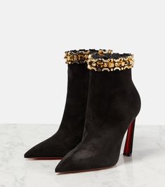 Find CHRISTIAN LOUBOUTIN Asteroispikes Embellished Suede Ankle Boots on Editorialist. Lining: leather. Closure: zipped side. Upper: calf leather. Sole: leather insole, signature red leather sole. Toe shape: pointed toe. Designer color name: Black/Gold. Comes with dust bags. Comes with a box. Made in Italy. Designer Embellished Fitted Boots, Luxury Studded Boots For Party, Luxury Studded Party Boots, Designer Embellished Evening Boots, Luxury Embellished Boots For Fall, Designer Embellished Pointed Toe Boots, Designer Embellished Boots With Pointed Toe, Luxury Spiked Boots For Party, Fitted Boots With Spikes For Evening