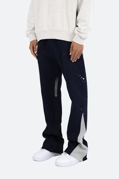 the Contrast Bootcut Sweatpants are designed with a relaxed fit throughout, featuring an elasticized self waist and leg opening, multi-colored paint splatter throughout, and finished with denim and contrasting panels at the inseam and outseam to provide a flare at the leg opening. details relaxed fit flared leg opening 55% cotton 45% polyester model is 6’1, 140 lbs and wears a size medium Mens Flare Sweatpants, Mens Flared Sweatpants, Flared Joggers Men, Flare Sweatpants Men, Stacked Sweatpants Men, Blood Dp, Flare Sweatpants Outfit, Bootcut Sweatpants, Sweatpants Design